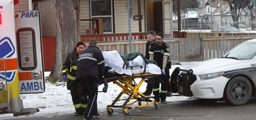 Winnipeg Police and Fire Paramedics at 594 Alfred Ave. near McGregor St. Friday morning attending to an incident Friday morning that sent two to hospital.  Wayne Glowacki / Winnipeg Free Press Dec. 11   2015