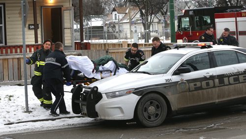 Winnipeg Police and Fire Paramedics at 594 Alfred Ave. near McGregor St. Friday morning attending to an incident Friday morning that sent two to hospital.  Wayne Glowacki / Winnipeg Free Press Dec. 11   2015