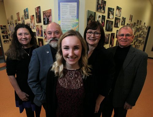 Left to right - Pam Campbell, Chris, Hanna and Debbie Brown and Jerry Storie pose at the Hearing and Speech Clinic. See Kevin Rollason story. December 11, 2015 - (Phil Hossack / Winnipeg Free Press)