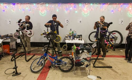 Dozens of volunteer mechanics from across the city came together at an old church at 1609 Elgin Ave West for a 24 hour kids bike building marathon, the Cycle of Giving. The goal: to turn trailers full of kids bikes recuperated from the Brady landfill and turn them into 350+ Christmas presents for kids in need, all the while raising $15,000 to provide bicycle programming for Winnipeg youth. 151213 - Sunday, December 13, 2015 -  MIKE DEAL / WINNIPEG FREE PRESS