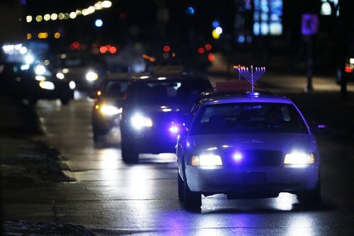 December 13, 2015 - 151213  -  Members of Chabab-Lubavitch Jewish Learning Centre take part in a parade through River Heights and Tuxedo in celebration of the Chanukah season Sunday, December 13, 2015. John Woods / Winnipeg Free Press