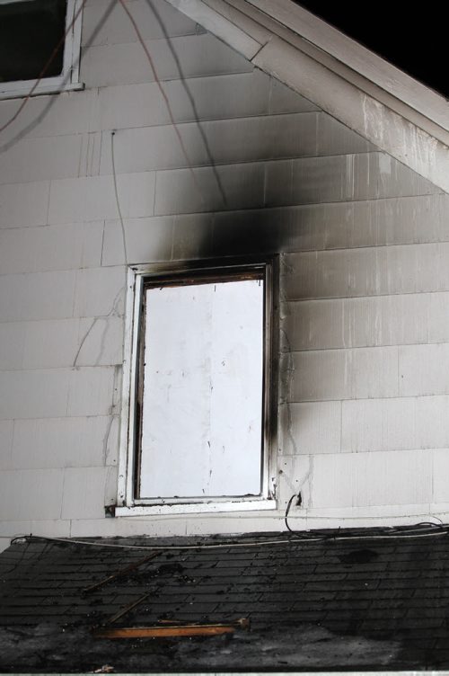 Signs of a hot fire at 354 Elgin Ave where Winnipeg Firefighters rescued a person from the second storey at aprx 1030 PM Monday night - see Alexander Paul storyDec 15, 2015   (JOE BRYKSA / WINNIPEG FREE PRESS)