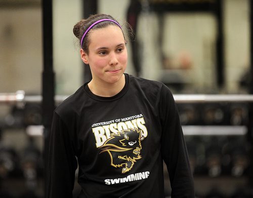 Kelsey Wog, Grade 12 swimmer who set three Canadian age group records in the last two weeks works out at the University of Manitoba Active Living Centre, high performance weight room Tuesday afternoon. See Melissa Martin's story..December 15, 2015 - (Phil Hossack / Winnipeg Free Press)
