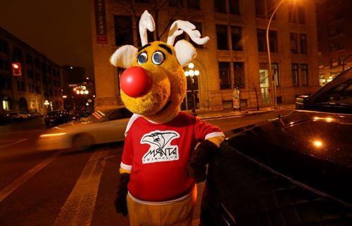 Josh, dressed as Rudy the Operation Red Nose reindeer mascot, Saturday, December 12, 2015. . (TREVOR HAGAN/WINNIPEG FREE PRESS)