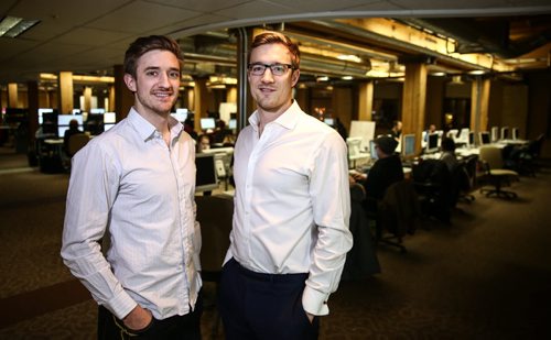 Chris Simair (left) and his brother Joshua (right) co-founders of Skip the Dishes have begun the move into their new offices on Market Avenue. The meal delivery business which is in many cities in Canada and the U.S. plans to expand from its 220 employees to around 550. 151216 - Wednesday, December 16, 2015 -  MIKE DEAL / WINNIPEG FREE PRESS