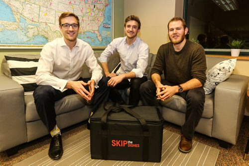 Joshua Simair (left) and his brother Chris (centre) along with Jeff Adamson who are all co-founders of Skip the Dishes have begun the move into their new offices on Market Avenue. The meal delivery business which is in many cities in Canada and the U.S. plans to expand from its 220 employees to around 550. 151216 - Wednesday, December 16, 2015 -  MIKE DEAL / WINNIPEG FREE PRESS