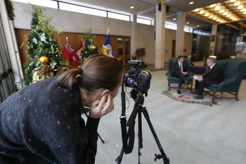 Mikaela MacKenzie records Mayor Brian Bowman at Winnipeg City Hall for year in review. Aldo Santin story.Wayne Glowacki / Winnipeg Free Press Dec. 16   2015