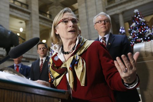 At the Manitoba Legislature in Winnipeg today, Thursday, December 17, 2015 Carolyn Bennett, Minister of Indigenous and Northern Affairs with Manitoba Premier Greg Selinger, City of Winnipeg mayor Brian Bowman, and Chief Erwin Redsky, Shoal Lake No.40 First Nation, announce an intergovernmental partnership that will benefit the First Nation by building a 24 km road from the community to the Trans Canada Highway.   THE CANADIAN PRESS/John Woods