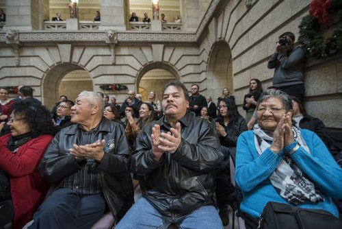 DAVID LIPNOWSKI / WINNIPEG FREE PRESS 151217   The audience aupplauds during a joint funding announcement for Freedom Road to Shoal Lake at the Manitoba Legislature Thursday December 17, 2015.