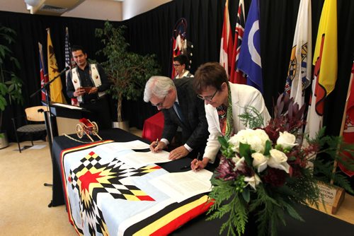 Dr. David Barnard, President of U of M and Dr. Annette Trimbee President of U of W, sign the  Indigenous Education Blueprints at a formal event Friday held at the U of M's Migizii Agamik  Bald Eagle Lodge. See Nick Martin story.  Dec 18, 2015 Ruth Bonneville / Winnipeg Free Press