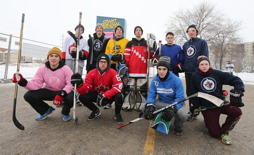 Members of the teams Keep It Nashty and The Winnipeggers line up on Dec. 19 at Grant Memorial Baptist Church for the Breakaway Street Hockey Classic charity tournament in support of Hospitality House, a non-profit organization that sponsors and supports refugees. Keep It Nashty defeated The Winnipeggers to win the six-team tourney. The tournament raised almost $3,500 for Hospitality House. In the last year, Hospitality House has sponsored over 600 newcomers to Winnipeg and helped them as they establish new homes. For more information on Hospitality House, visit hhrmwpg.org. Photo by Jason Halstead/Winnipeg Free Press RE: Social Page