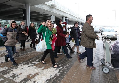 The Daas family from Syria, one of the first families to arrive into Winnipeg, are all smiles as they leave the Airport and head out with their sponsors to settle in Altona. See MA story.  Dec 19, 2015 Ruth Bonneville / Winnipeg Free Press