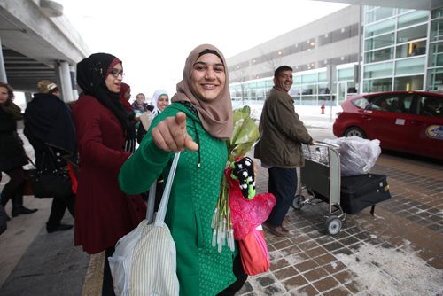 The Daas family from Syria, one of the first families to arrive into Winnipeg, are all smiles as they leave the Airport and head out with their sponsors to settle in Altona. See MA story.  Dec 19, 2015 Ruth Bonneville / Winnipeg Free Press