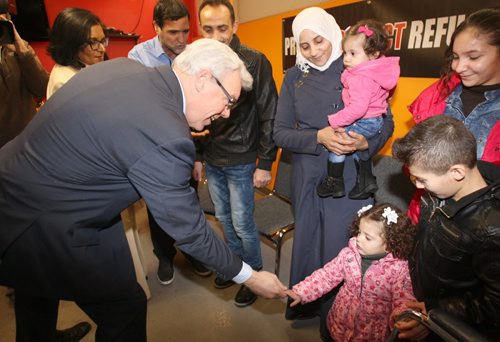 Former Syrian refuges the Albakar family is welcomed by Manitoba Premier Greg Selinger at official welcome ceremony at Welcome House 521 Bannatyne Ave  Other dignitaries not pictured in attendance Mayor Brian Bowman, and Jim Carr Minister of Natural Recourses, Government of Canada-See Carol Sanders storyDec 17, 2015 (JOE BRYKSA / WINNIPEG FREE PRESS)
In photo - (CW) Father Yaser Albakar (in leather jacket), mother Raghdaa, Sham (baby), Riham, Mohamed, Hadil.