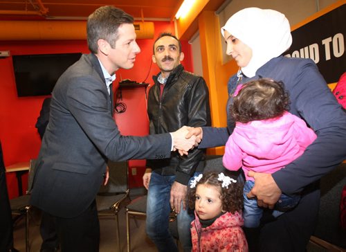 Former Syrian refuges the Albakar family is welcomed by Mayor Brian Bowman at official welcome ceremony at Welcome House 521 Bannatyne Ave  Other dignitaries not pictured in attendance Premier Greg Selinger, and Jim Carr Minister of Natural Recourses, Government of Canada-See Carol Sanders storyDec 17, 2015 (JOE BRYKSA / WINNIPEG FREE PRESS)
In Photo - Father Yaser Albakar (in leather jacket, mother Raghdaa, Sham (baby), Hadil (bottom)