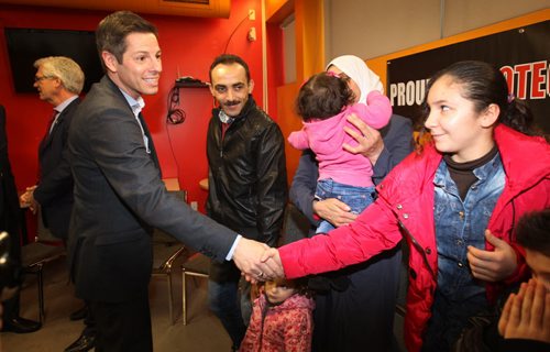 Former Syrian refuges the Albakar family is welcomed by Mayor Brian Bowman at official welcome ceremony at Welcome House 521 Bannatyne Ave  Other dignitaries not pictured in attendance Premier Greg Selinger, and Jim Carr Minister of Natural Recourses, Government of Canada-See Carol Sanders storyDec 17, 2015 (JOE BRYKSA / WINNIPEG FREE PRESS)
Father Yaser Albakar (in leather jacket, mother Raghdaa, Sham (baby), Riham, Hadil (bottom)