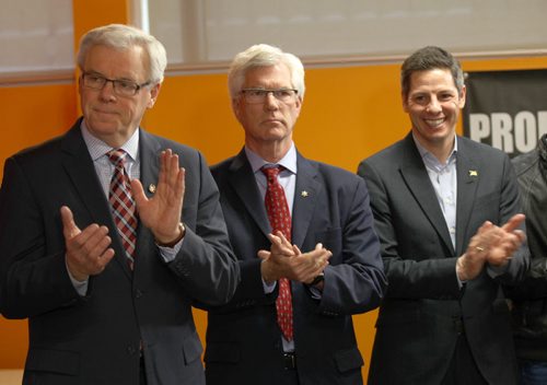 Premier Greg Selinger,left, and Jim Carr Minister of Natural Recourses, Government of Canada,centre, and mayor Brian Bowman official welcome ceremony at Welcome House 521 Bannatyne Ave for former Syrian refugees -See Carol Sanders storyDec 17, 2015 (JOE BRYKSA / WINNIPEG FREE PRESS)