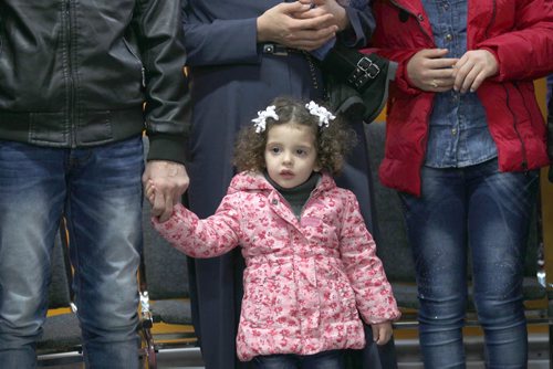 Former Syrian refuges- the Albakar family including 3 yr old child at official welcome ceremony at Welcome House 521 Bannatyne Ave  Other dignitaries not pictured in attendance Premier Greg Selinger, and Jim Carr Minister of Natural Recourses, Government of Canada, and mayor Brian Bowman-See Carol Sanders storyDec 17, 2015 (JOE BRYKSA / WINNIPEG FREE PRESS)
in photo - Hadil Albakar, 2