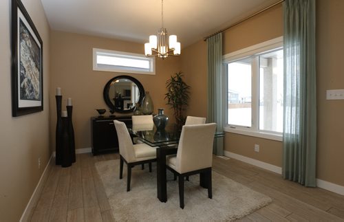 Homes 19 Cotswold Place in River Park South. The dining room. The Qualico sales rep is Brenda Johnson.  Todd Lewys story Wayne Glowacki / Winnipeg Free Press Dec. 21  2015