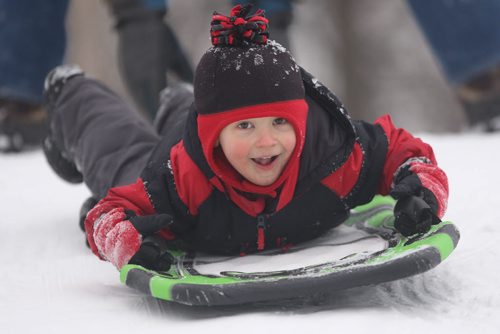 Gavin Lee, 4 years enjoys a wonderful day Tuesday sledding at Kildonan Park during their Christmas break Standup PhotoDec 22, 2015 (JOE BRYKSA / WINNIPEG FREE PRESS)