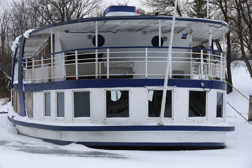 49.8  OLD BOATS. The stern of the River Rouge frozen in the  slough north of Selkirk, Mb.    Bill Redekop story   Wayne Glowacki / Winnipeg Free Press Dec. 22  2015