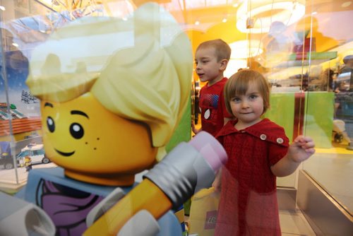 Jakob Kehler, 5, and his sister, Aleena, 2, shopping together at Polo Park with their parents, Jeremy and Jinelle and brother Daniel, Saturday, December 26, 2015. (TREVOR HAGAN / WINNIPEG FREE PRESS)