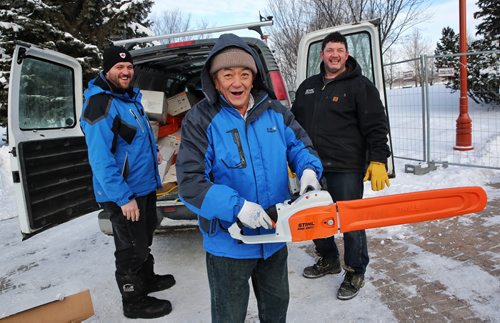 Zuyun Hu, an ice sculptor from China, brandishes one of the couple dozen chainsaws that was delivered to the site at The Forks where the Great Ice Show will be built.  151228 December 28, 2015 MIKE DEAL / WINNIPEG FREE PRESS