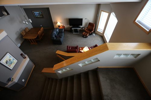 Homes Resale 113 Wayfarers Haven living room, dinning room and stairs 151228 - Monday, December 28, 2015 -  MIKE DEAL / WINNIPEG FREE PRESS