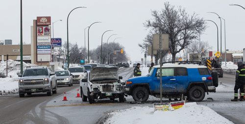 An car accident at Keewatin and Kinver slowed down traffic going north and south on Keewatin Wednesday morning. No word on injuries. 151230 - Wednesday, December 30, 2015 -  MIKE DEAL / WINNIPEG FREE PRESS