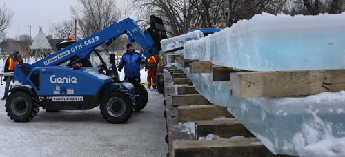 The first load of ice blocks cut from a pond in a Birds Hill gravel pit arrived at The Forks Wednesday on a flat bed that will be used by the team of Chinese ice artisans in Winnipeg to create The Great Ice Show. Each of the 250-kilogram blocks was carefully carried to the site by fork lift. These blocks will form the base of a snow and ice sculpture winter wonderland modelled after the largest ice festival in the world, the Harbin International Ice and Snow Sculpture Festival in Harbin, China. They hope to open The Great Ice Show in the third week of January. see  Danielle Doiron  for more info. Wayne Glowacki / Winnipeg Free Press Dec. 30  2015