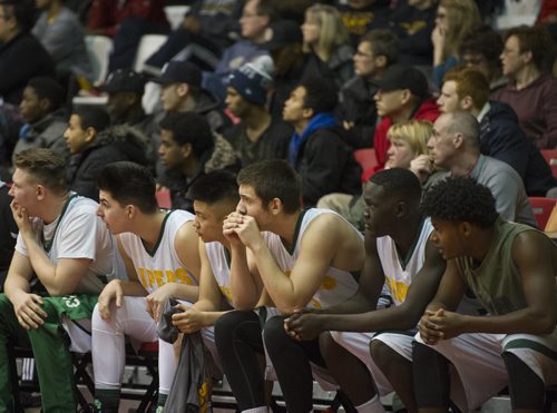 DAVID LIPNOWSKI / WINNIPEG FREE PRESS 151230   John Taylor Pipers watch the final moments of the game in suspense December 30, 2015 as the Pipers defeated the Fighting Gophers 84-80 during the 49th Wesmen Classic High School Final at the Duckworth Centre.