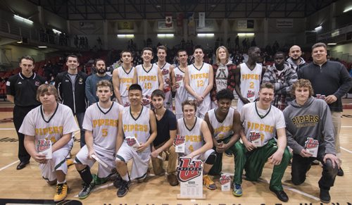 DAVID LIPNOWSKI / WINNIPEG FREE PRESS 151230  John Taylor Pipers pose for a photo as winners December 30, 2015 as the Pipers defeated the Fighting Gophers 84-80 during the 49th Wesmen Classic High School Final at the Duckworth Centre.