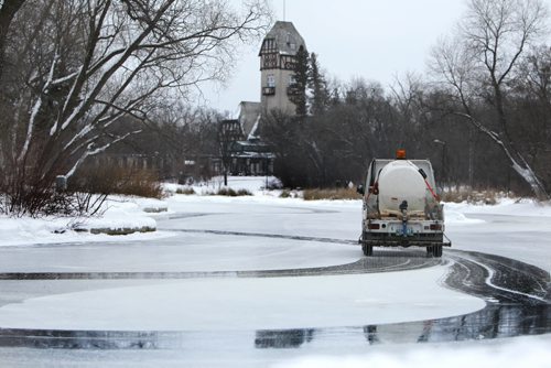 Assiniboine Park Conservancy maintenance crews make their last rounds as they flood the Duck Pond on New Years Eve Day just prior to it opening.  It officially opened to the public just before noon today.    Standup   Dec 31, 2015 Ruth Bonneville / Winnipeg Free Press