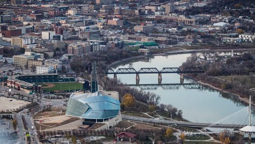 Winnipeg skyline aerial photos for the Red, Assiniboine, La Salle, and Seine River Project. Waterfront Drive, Shaw Stadium, and The Canadian Museum for Human Rights along with the Red River. 151026 - Monday, October 26, 2015 -  MIKE DEAL / WINNIPEG FREE PRESS