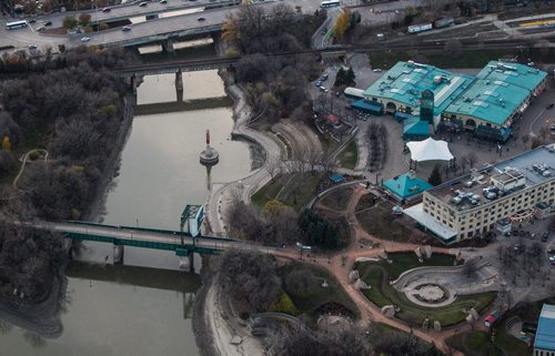 Winnipeg skyline aerial photos for the Red, Assiniboine, La Salle, and Seine River Project. The Assiniboine River and The Forks as the sun sets. 151026 - Monday, October 26, 2015 -  MIKE DEAL / WINNIPEG FREE PRESS