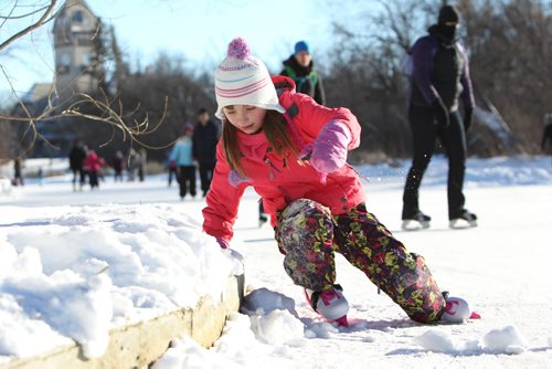Seven-year-old Emilie Lavalle learns to skate for the first time while with her family on the Duck Pond at Assiniboine Park on New Year's Day.   Standup  Jan 01, 2016 Ruth Bonneville / Winnipeg Free Press
