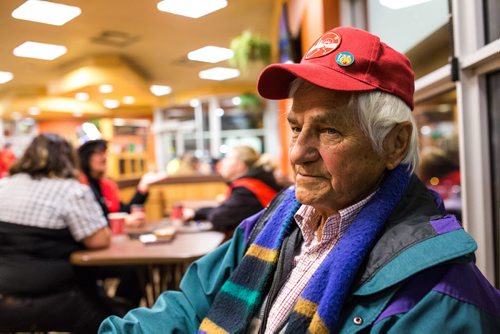 Wally Stoyko, a driver for Operation Red Nose, sits in a coffee shop waiting to get a call for someone looking for a ride. December 31, 2015. (GREG GALLINGER / WINNIPEG FREE PRESS)