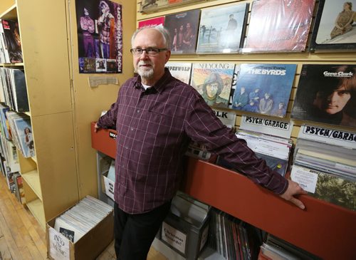 Winnipeg professor and music writer John Einarson check out vinyl records at Into The Music in the Exchange on Jan. 2, 2016. Photo by Jason Halstead/Winnipeg Free Press RE: Story on boom in vinyl record sales