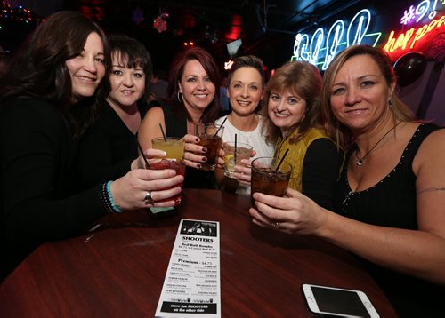 From left, Melissa David, Susie Parker, Kenra DeLuca, Vivian Carr, Evelyn C. (didn't want last name used), Darcie Buxton enjoy themselves at the Palomino Club on Jan. 2, 2016. It was the last night for the West End bar. Photo by Jason Halstead/Winnipeg Free Press