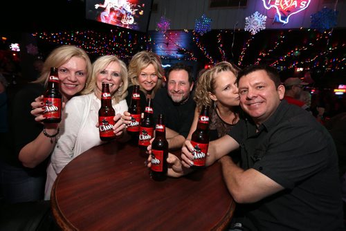From left, Dawn Loster, Arlene Johnson, Cindy Van, James Kulas, Di McDougall and Jim McDougall enjoy themselves at the Palomino Club on Jan. 2, 2016. It was the last night for the West End bar. Photo by Jason Halstead/Winnipeg Free Press