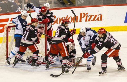 DAVID LIPNOWSKI / WINNIPEG FREE PRESS 160103  Manitoba Moose battle Grand Rapids Griffins Sunday January 3, 2016 at MTS Centre.