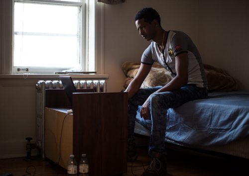 Simon Hagos, at his apartment of Broadway is an Eritrean refugee who arrived in January 2015. 160104 - Monday, January 4, 2016 -  MIKE DEAL / WINNIPEG FREE PRESS