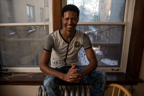 Simon Hagos, at his apartment of Broadway is an Eritrean refugee who arrived in January 2015. 160104 - Monday, January 4, 2016 -  MIKE DEAL / WINNIPEG FREE PRESS