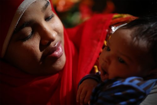 Monday, January 4, 2016 - Sagal Abdi Ali, a refugee from Somalia, is photographed with her two sons Ryaaz, 2, and Ridwan, 1 month, in her cousin's home Monday, January 4, 2016. Sagal was sponsored by her cousin and came to Canada is September. John Woods / Winnipeg Free Press