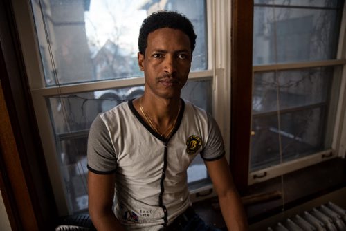 Simon Hagos, at his apartment of Broadway is an Eritrean refugee who arrived in January 2015. 160104 - Monday, January 4, 2016 -  MIKE DEAL / WINNIPEG FREE PRESS