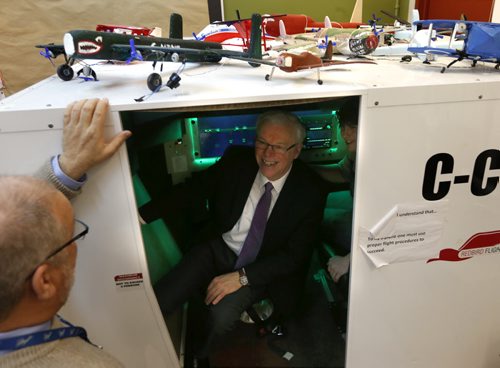 Premier Greg Selinger exits the flight simulator in the aviation classroom at Sturgeon Heights Collegiate Tuesday after making the announcement the Manitoba government will be increasing the provinces share of the $2.25-billion public education system by $32.5 million  or 2.55 per cent.  Nick Martin story Wayne Glowacki / Winnipeg Free Press Jan. 5 2016