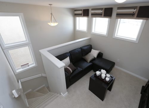 Homes. 148 Cherrywood Road in Bridgwater Trails. Sitting area on second floor by the staircase at left.  Kensington Homes sales rep is Heather Daniels.  Todd Lewys story Wayne Glowacki / Winnipeg Free Press Jan. 4 2016