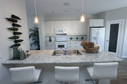 Homes. 148 Cherrywood Road in Bridgwater Trails. The kitchen. Kensington Homes sales rep is Heather Daniels.  Todd Lewys story Wayne Glowacki / Winnipeg Free Press Jan. 4 2016