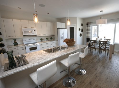 Homes. 148 Cherrywood Road in Bridgwater Trails. The kitchen and dining area. Kensington Homes sales rep is Heather Daniels.  Todd Lewys story Wayne Glowacki / Winnipeg Free Press Jan. 4 2016