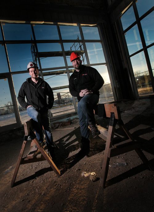 The "Brothers of Bargains", Andrew (left) and Doug MacIver, are in the middle of a $5-million expansion of their used car dealership. They're posing in what will be their new showroom at on Oak Point Highway. See Geoff Kirbyson's story. January 5, 2016 - (Phil Hossack / Winnipeg Free Press)